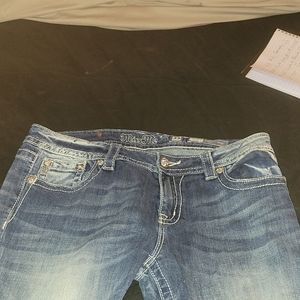 Miss me boot cut jeans. Size 33 and a medium wash.